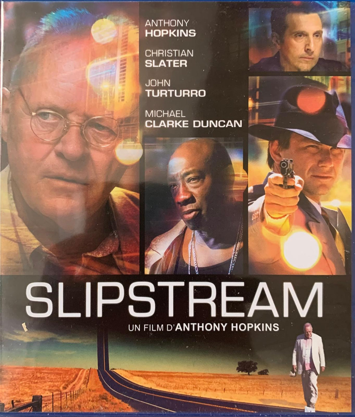 The slipstream blu-ray movie poster features anthony hopkins christian slater john turturro and michael clarke duncan with a desert road background