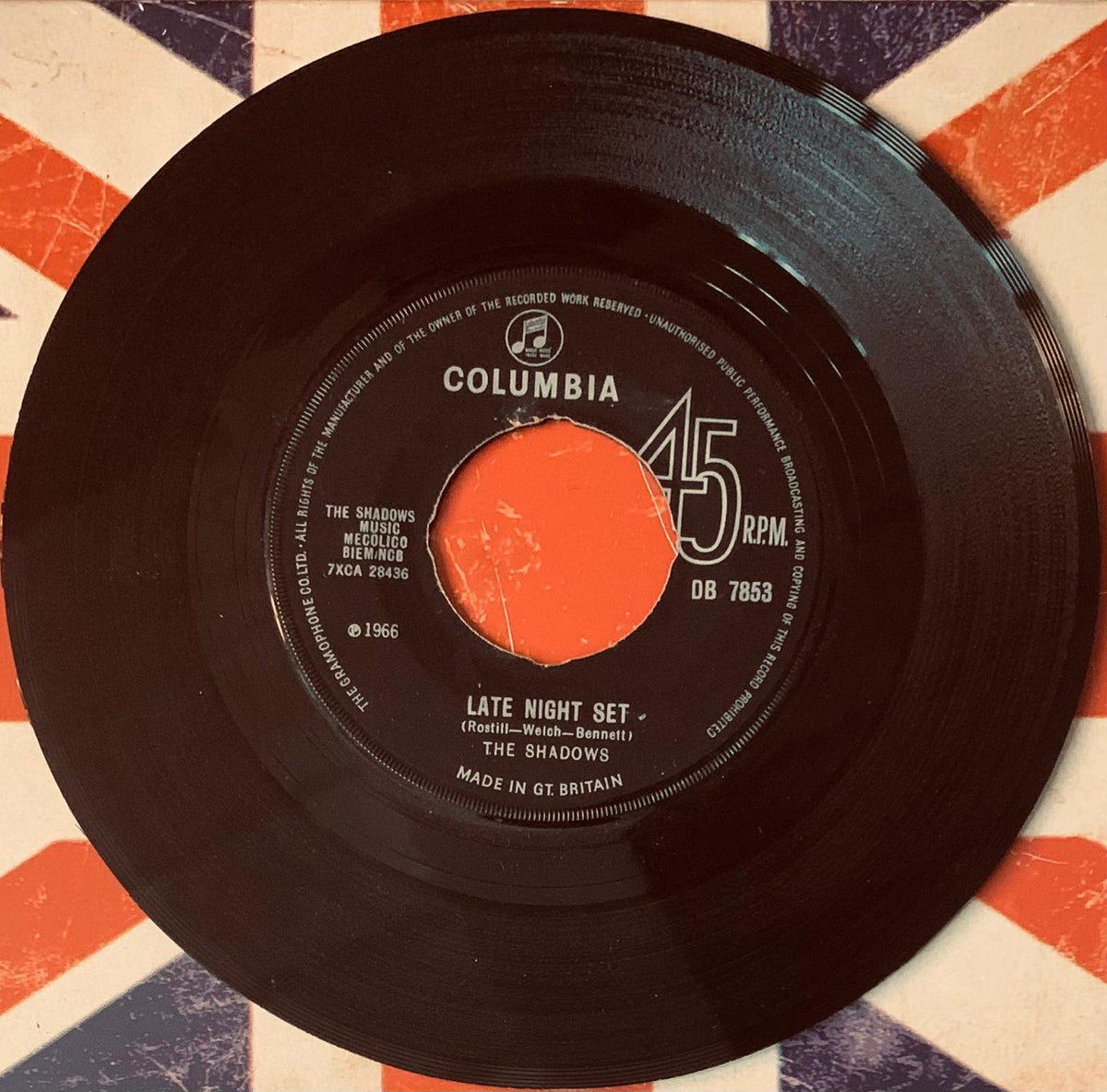 Black vinyl 45 rpm record with bright orange columbia label featuring the shadows late night set from 1966