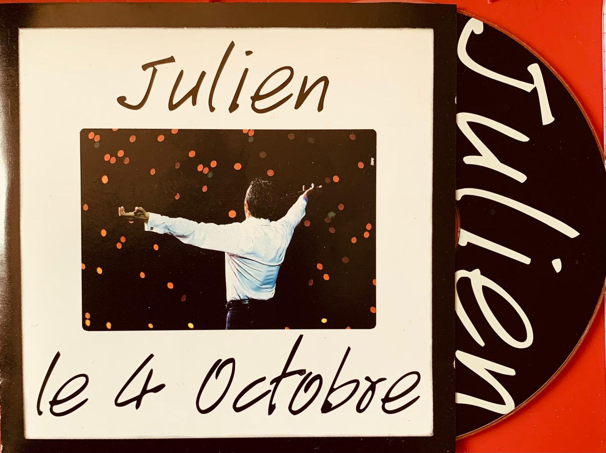 Black vinyl record with white cursive lettering julien on surface from julien clerc le 4 octobre original cd