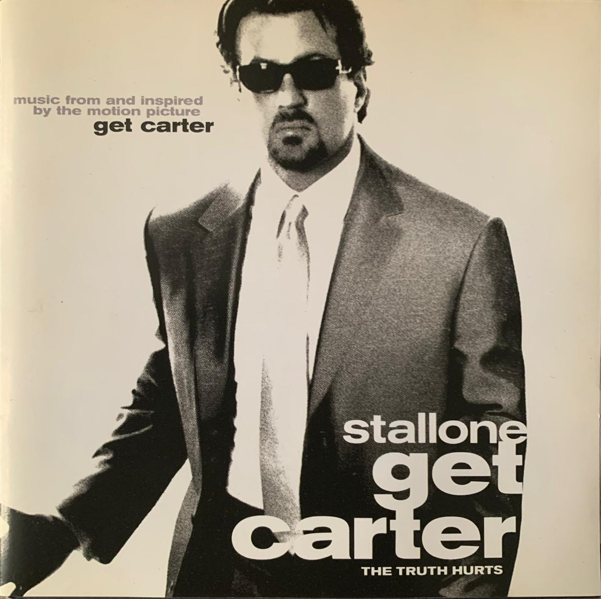 Black and white album cover of get carter original motion picture soundtrack featuring man in sunglasses suit and tie