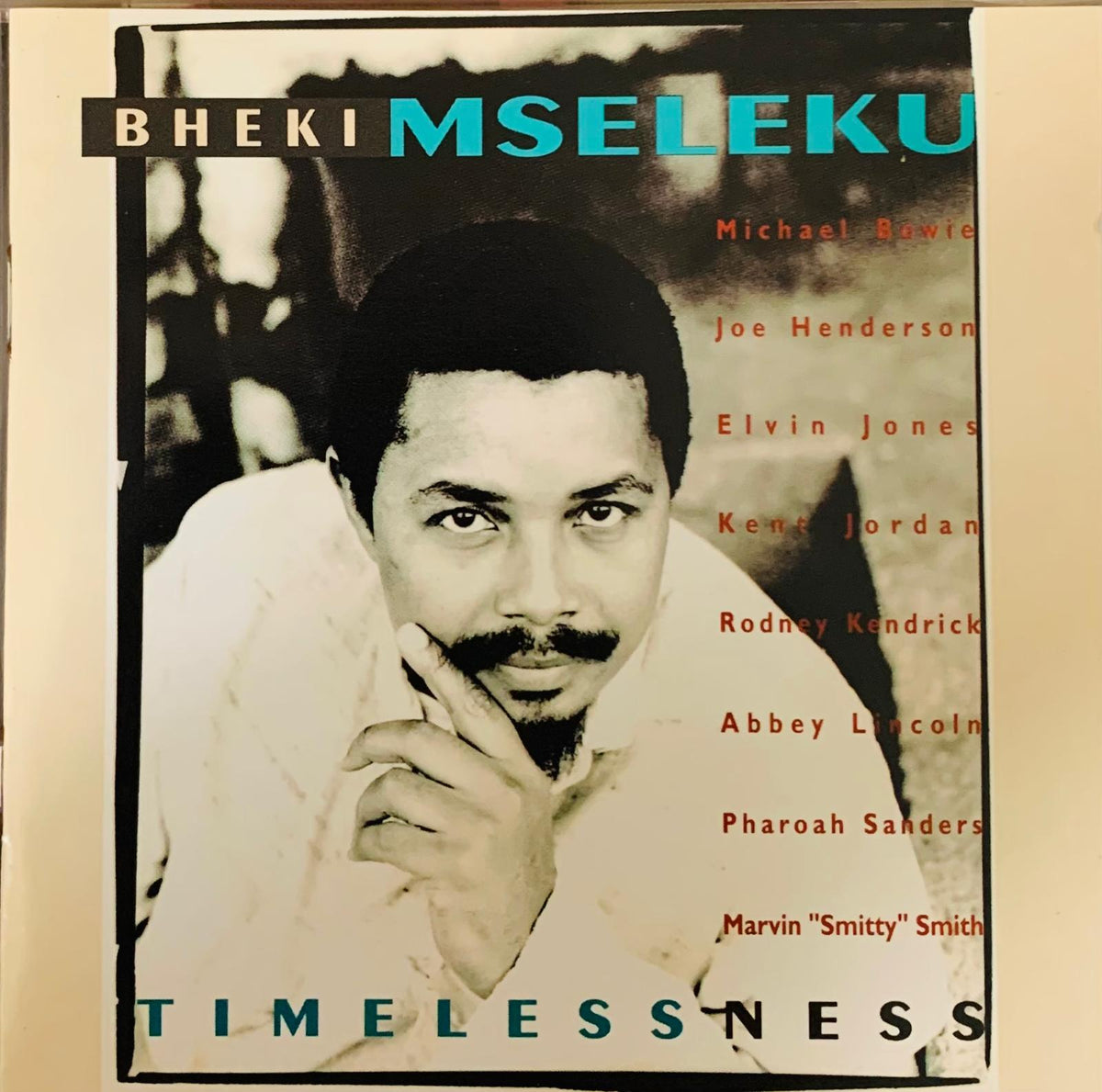 Black-and-white album cover of bheki mseleku timelessness with teal and red text listing musicians on original 1994 cd