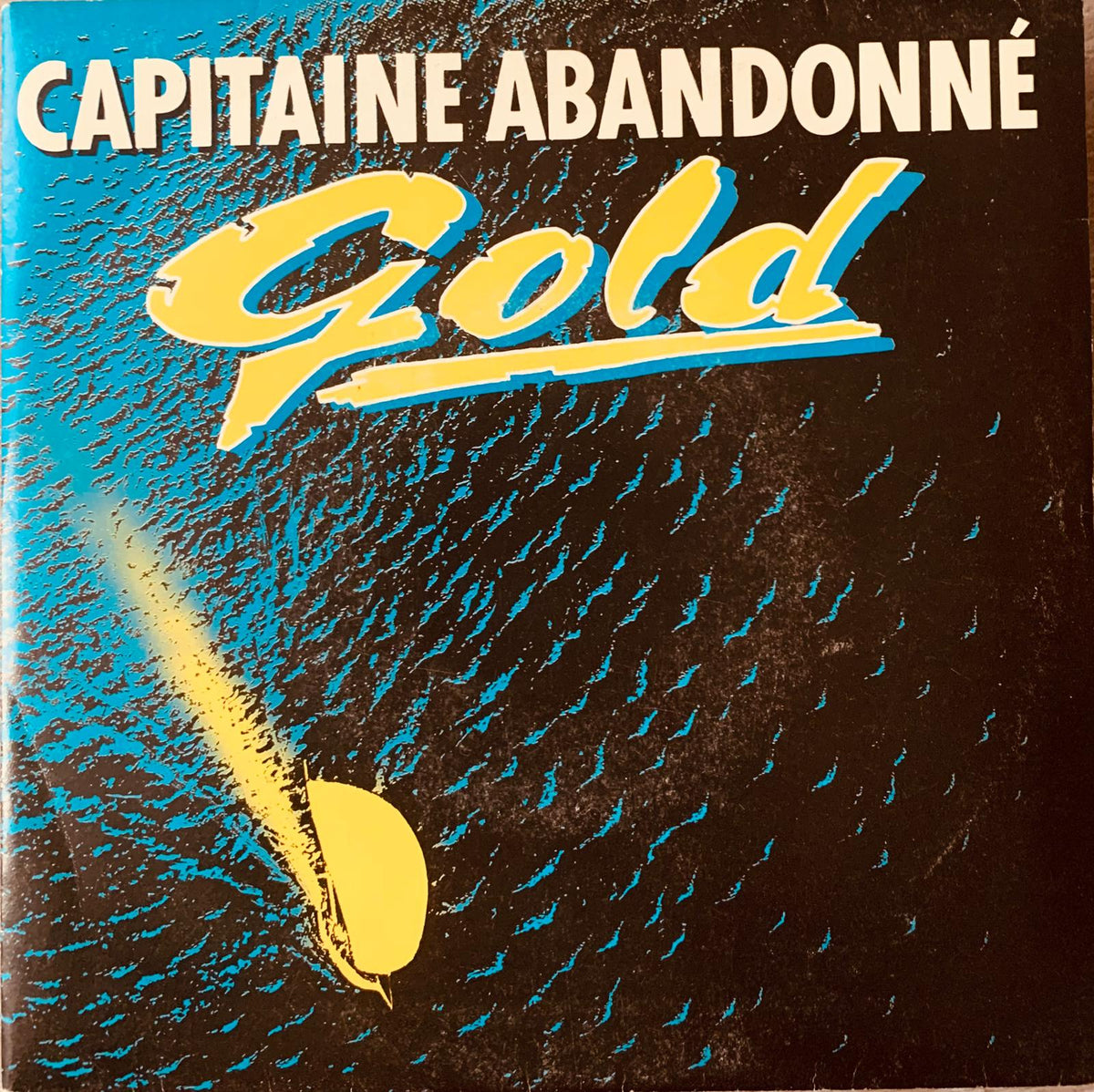 Vibrant blue and yellow vinyl album cover for gold by capitaine abandonné from the 1980s original record collection