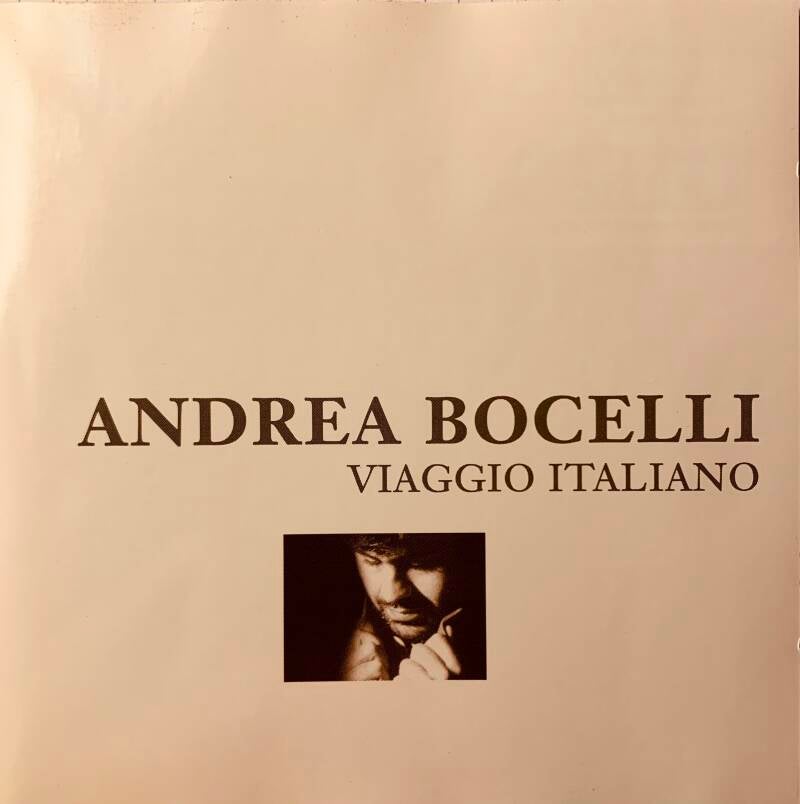 Cream-colored vinyl record sleeve of Andrea Bocelli Viaggio Italiano album featuring a classic Italian music CD