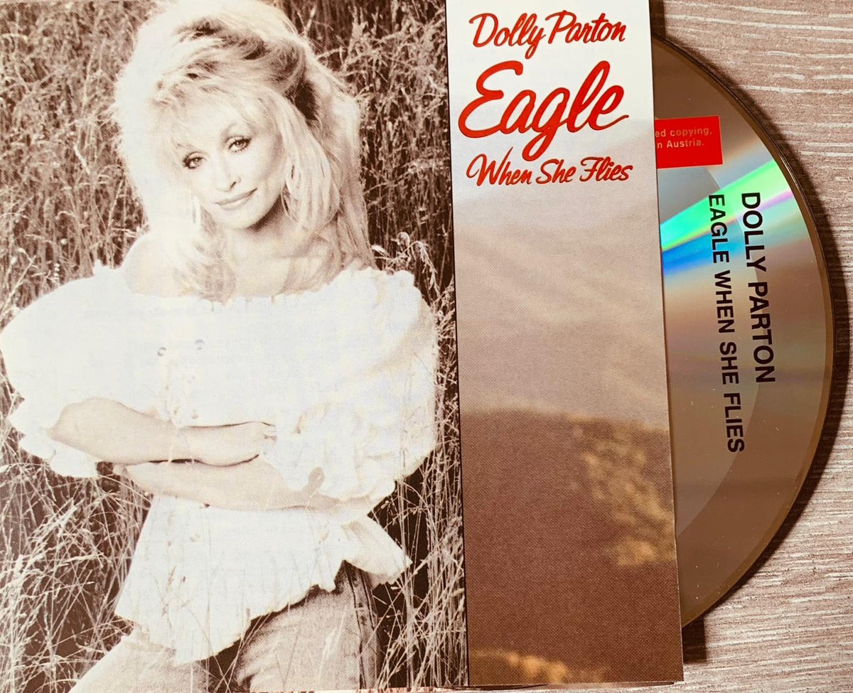 Dolly parton eagle when she flies 1991 original cd with sepia-toned cover art and gold-colored disc