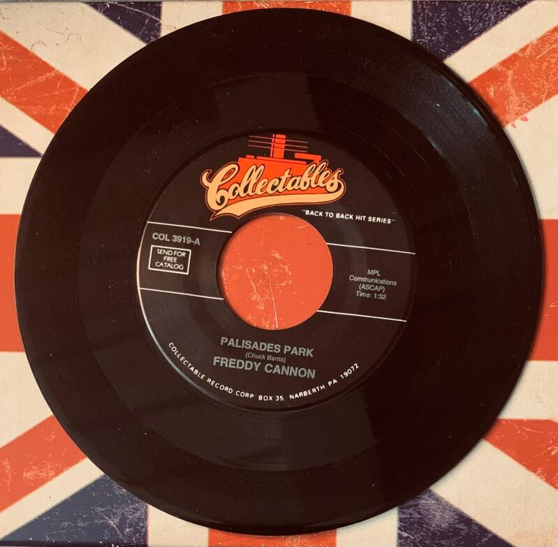 Black vinyl record with red collectables center label featuring palisades park by freddy cannon 7 inch back to back hit series near mint
