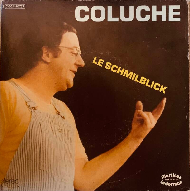 Coluche – Le Schmilblick — Vg+ / Vg+