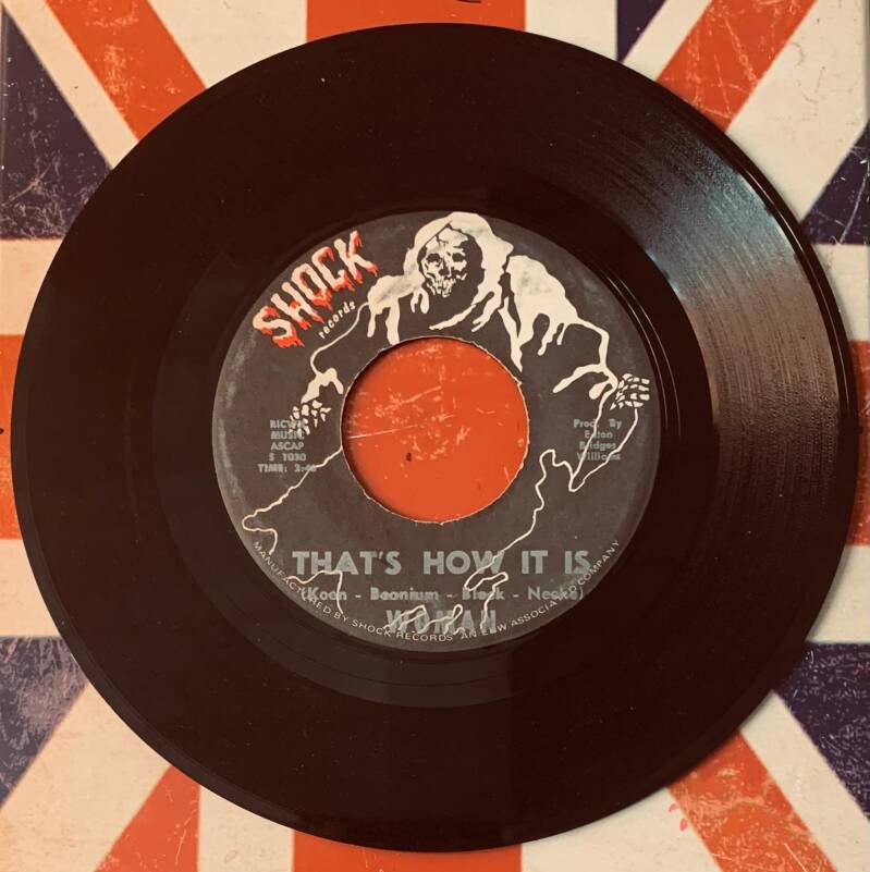 Black vinyl 7 inch single by the soulful strutters with white skeleton design and orange shock records label