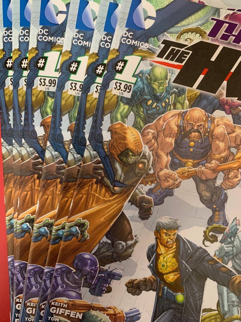 Dc comics the new 52 #1 comic book lot featuring vibrant, action-packed artwork with bold colors and dynamic designs
