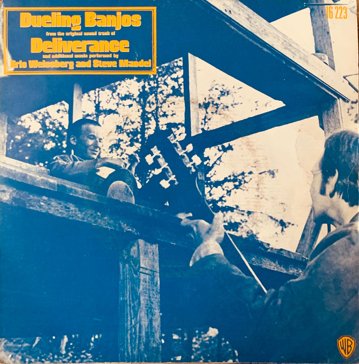 Blue and yellow vinyl record cover of eric weissberg and steve mandel playing banjos under a wooden structure