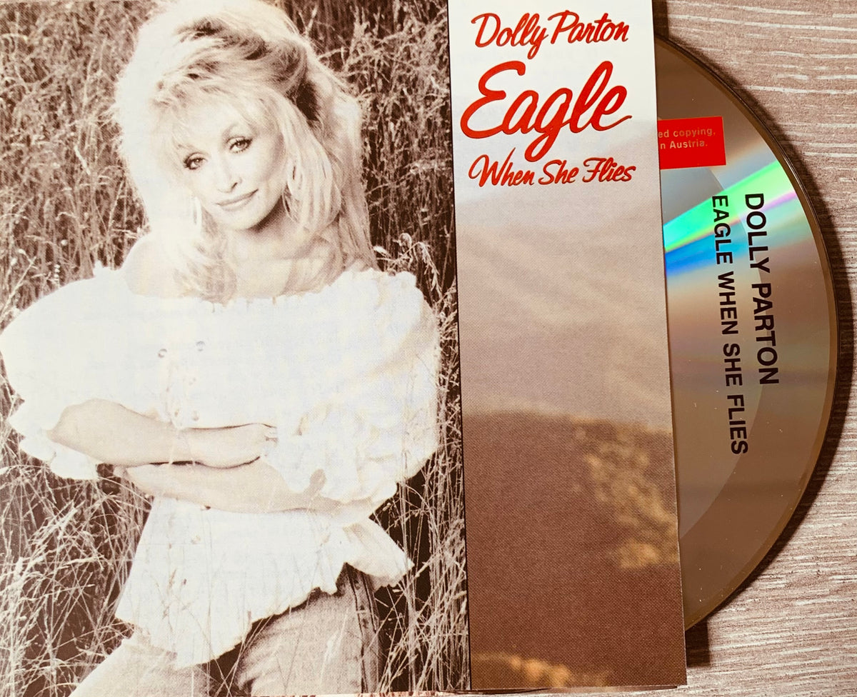Dolly Parton eagle when she flies CD album with sepia-toned cover art and gold-colored disc CD 001 product