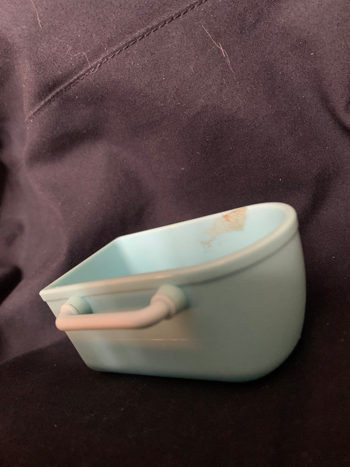 Light blue ceramic baby bathtub with a pale pink handle ideal for infants in toys 001 collection