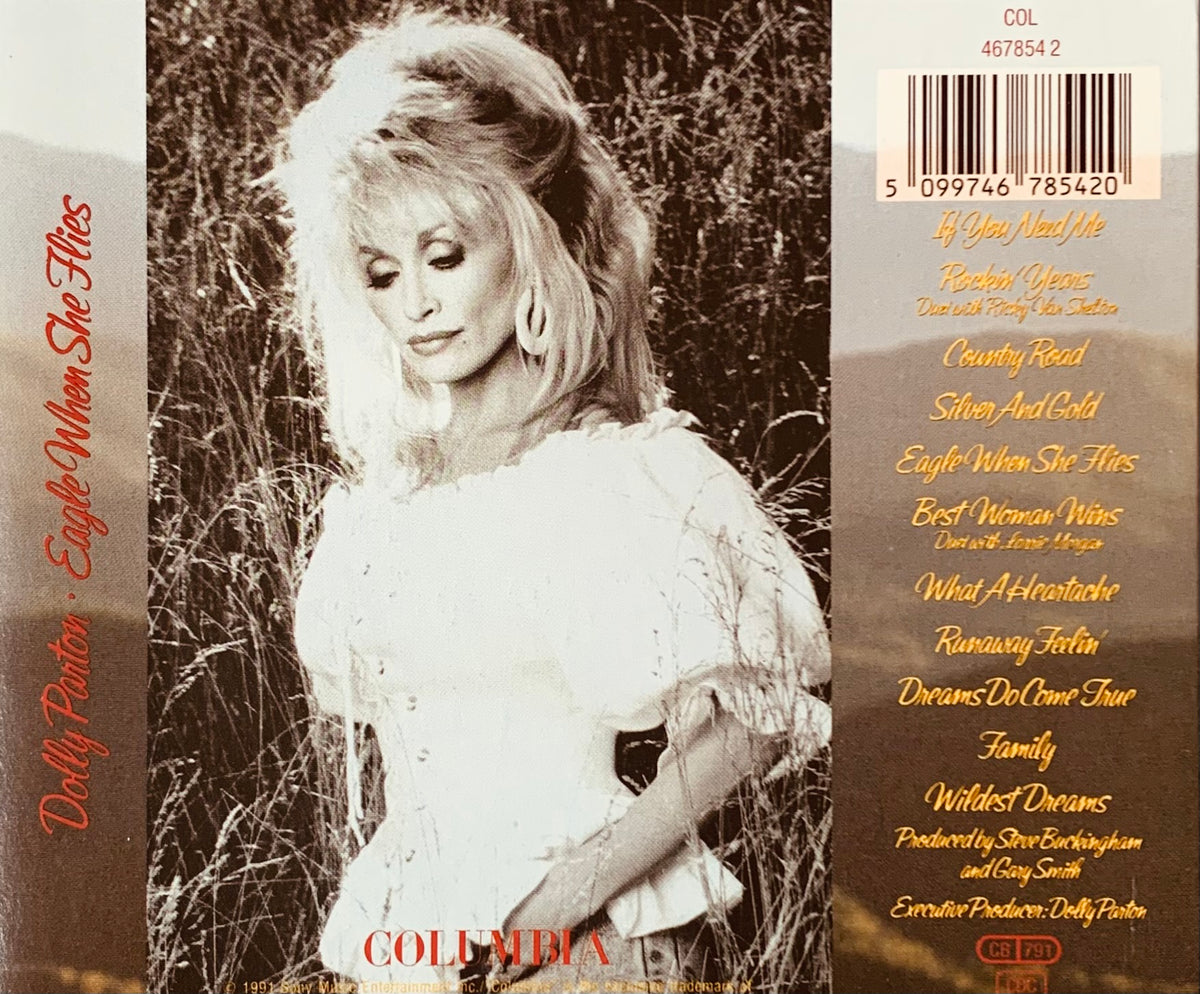 The back cover of dolly partons 1987 cd eagle when she flies features a sepia photo of her in a white ruffled blouse