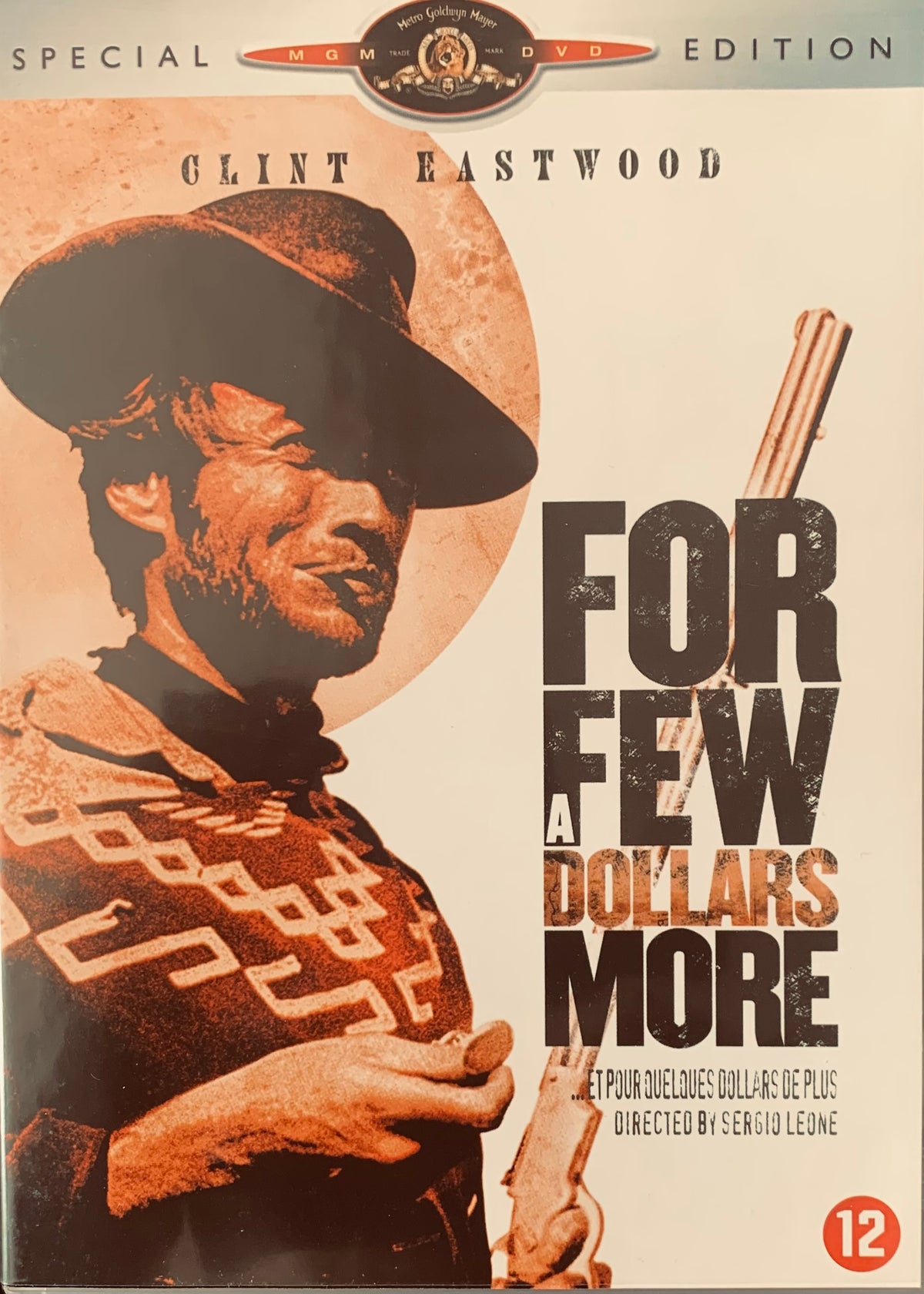 Special edition dvd cover for for a few dollars more starring clint eastwood in a brown cowboy hat on orange background