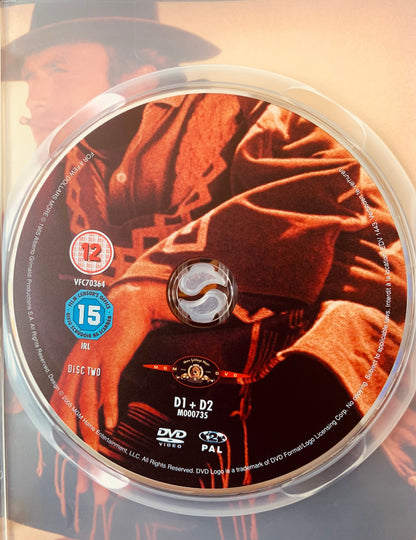 A dvd disc from dvd 3 coffrets featuring a western-themed image in warm orange and brown tones in clear plastic case