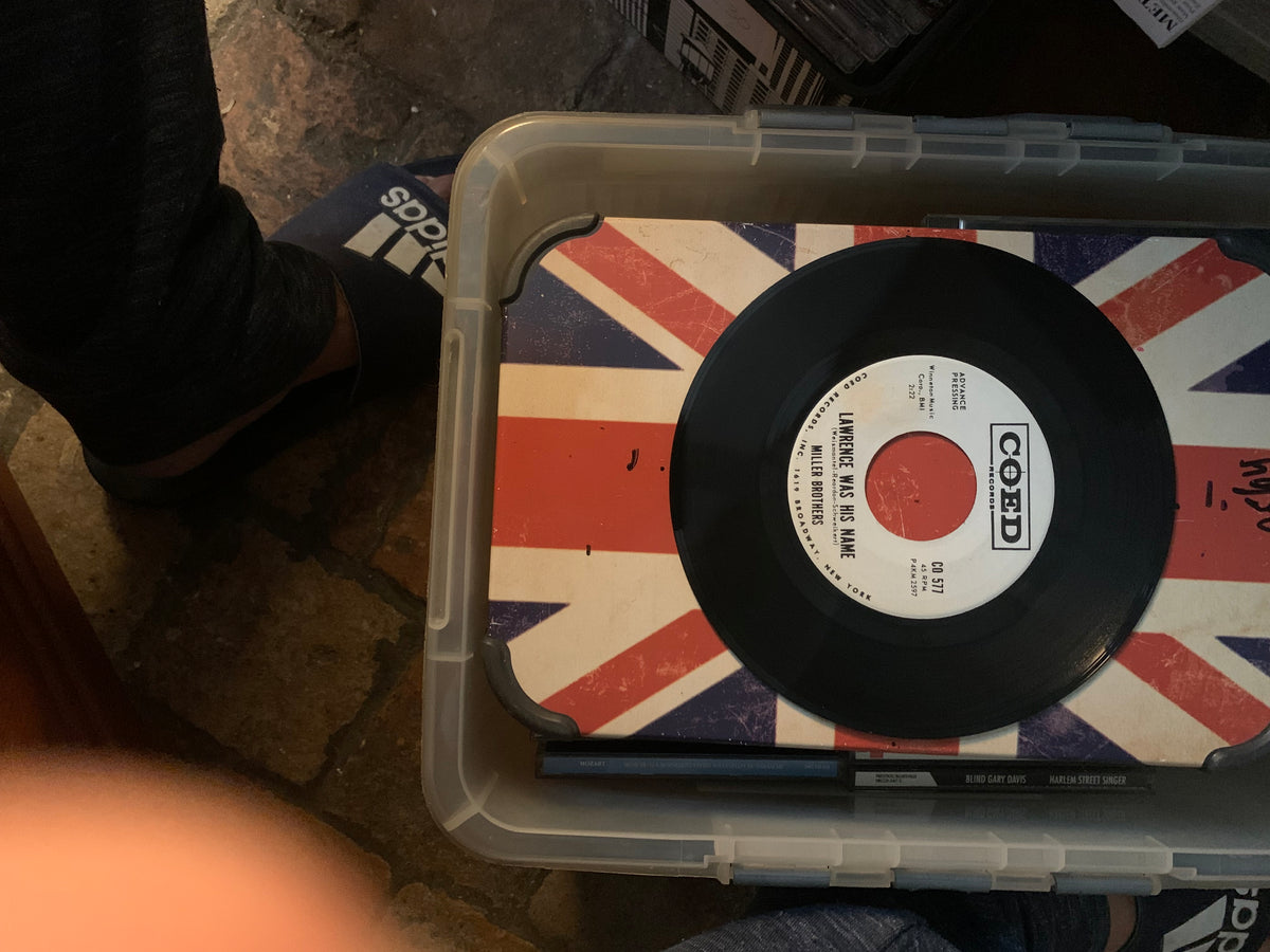 Black vinyl record soul 7 with white label featuring red and black text on union jack surface inside clear plastic case