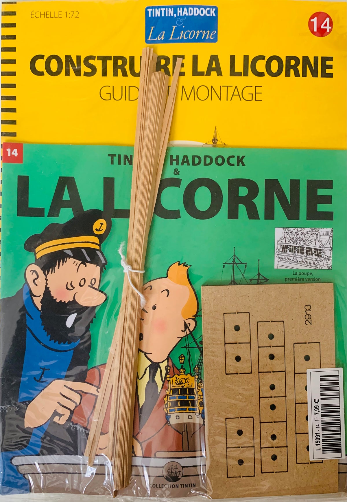 Yellow and green tintin haddock la licorne model kit with wooden sticks cardboard pieces and instruction booklet