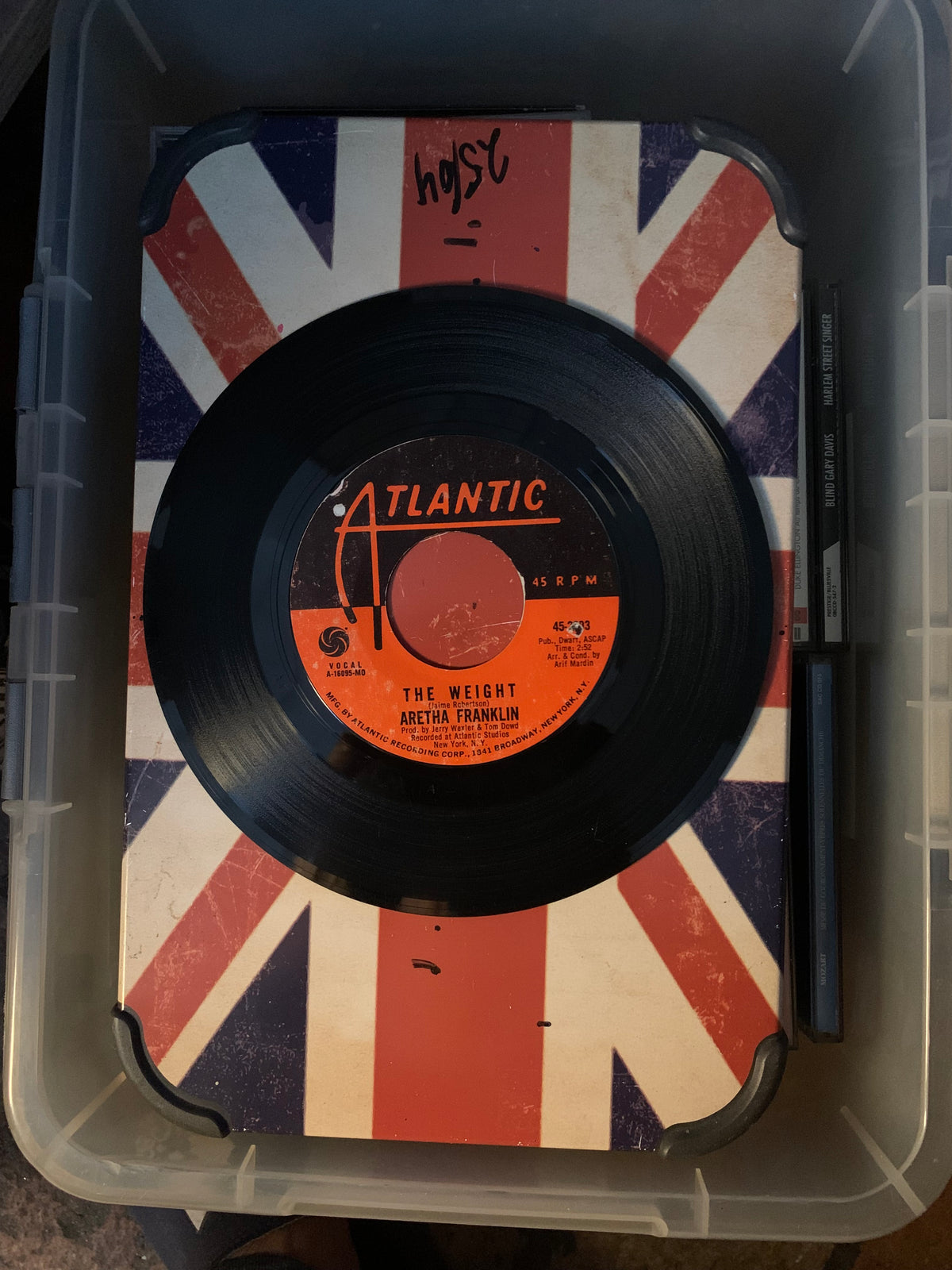 Black vinyl record with orange atlantic label featuring aretha franklin the weight from soul 7 inch collection