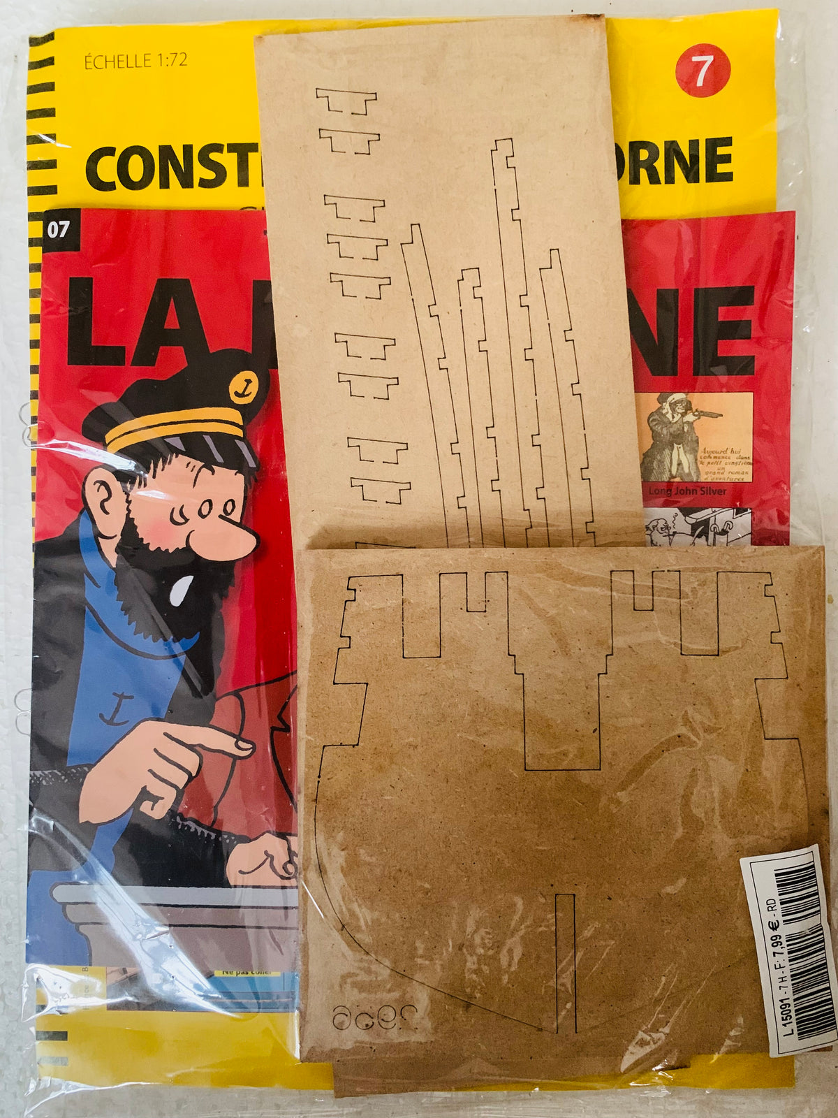 Brown cardboard model kit instructions for miniature castle la licorne showing assembly steps and parts list