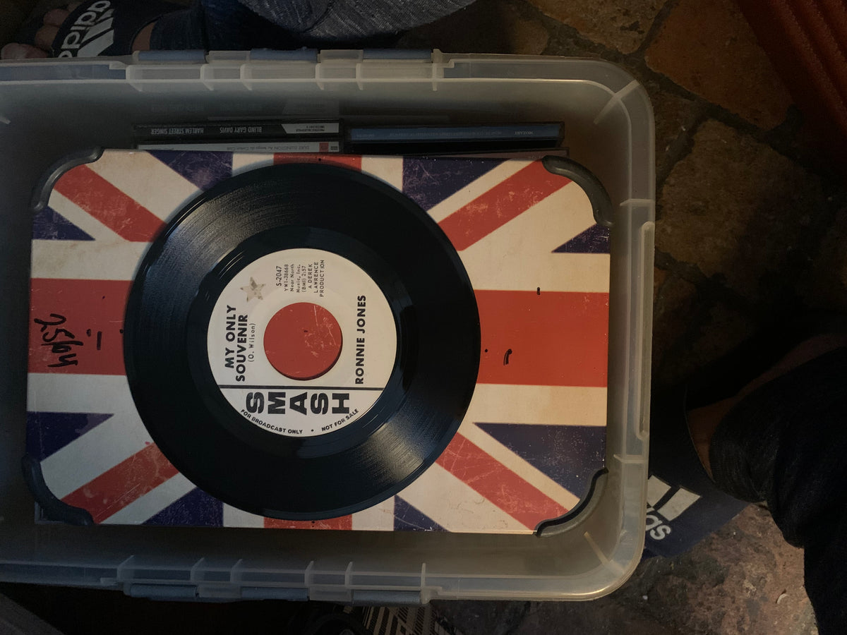 Black vinyl soul 7 inch record with white label featuring red and black text on union jack surface
