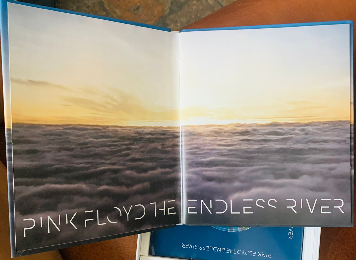 Open book punk floyd endless summer with pink floyd the endless river album cover sunset clouds on glossy paper