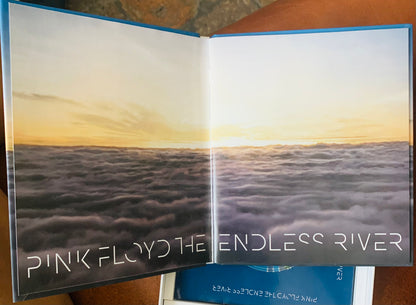 Open book punk floyd endless summer with pink floyd the endless river album cover sunset clouds on glossy paper