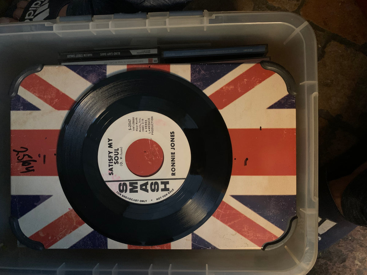 Black vinyl record soul 7 inch with white label featuring red and black text on union jack surface