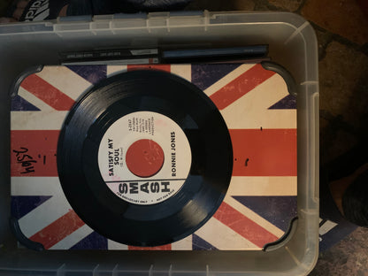 Black vinyl record soul 7 inch with white label featuring red and black text on union jack surface