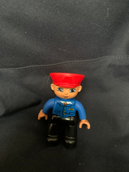 Blue and black plastic lego duplo train conductor figure with red cap from toys 001