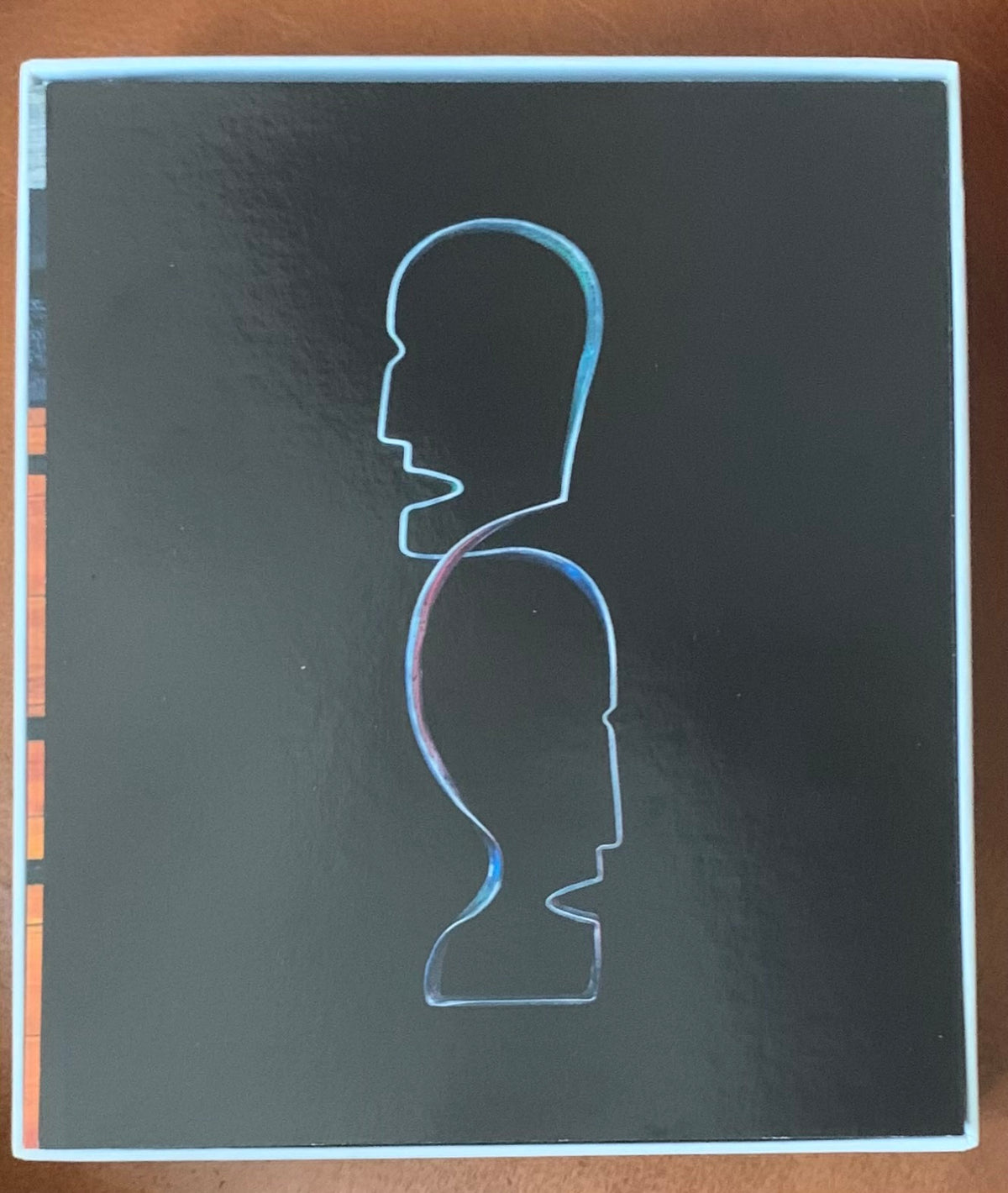 Black album cover for punk floyd endless summer featuring minimalist glowing blue outline of two overlapping human heads