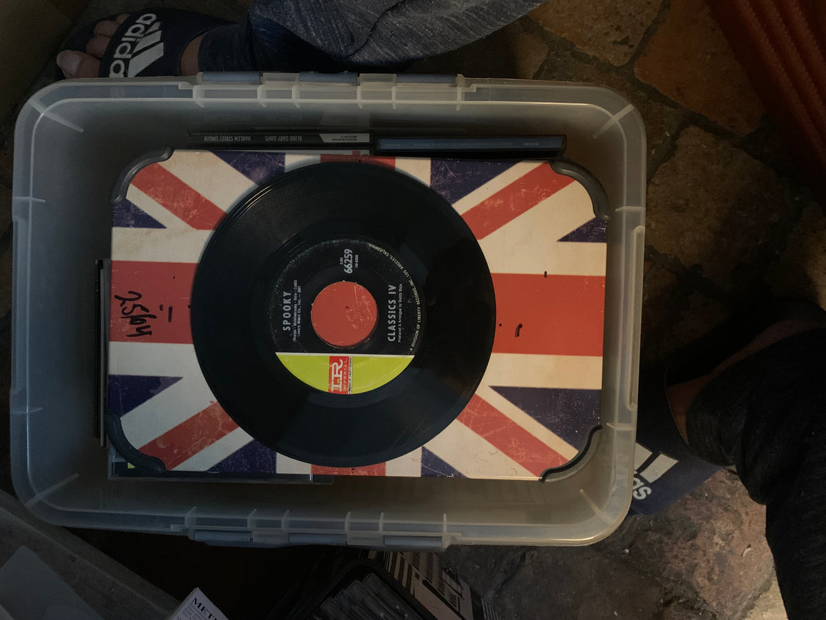 Black vinyl record with red and yellow label featuring spooky by classics iv from the soul 7 collection