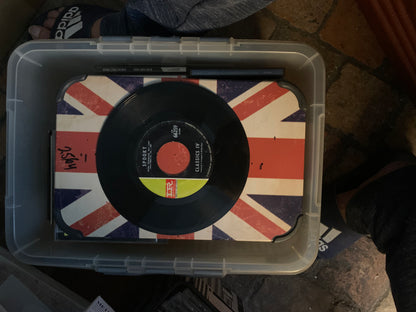 Black vinyl record with red and yellow label featuring spooky by classics iv from the soul 7 collection