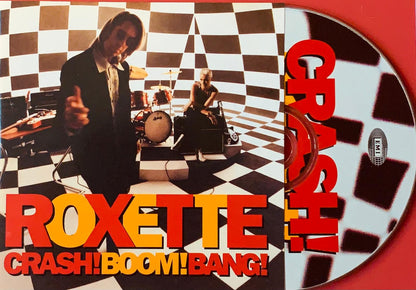 The cd cover for Roxette crash boom bang features a black and white checkered design with bold red lettering