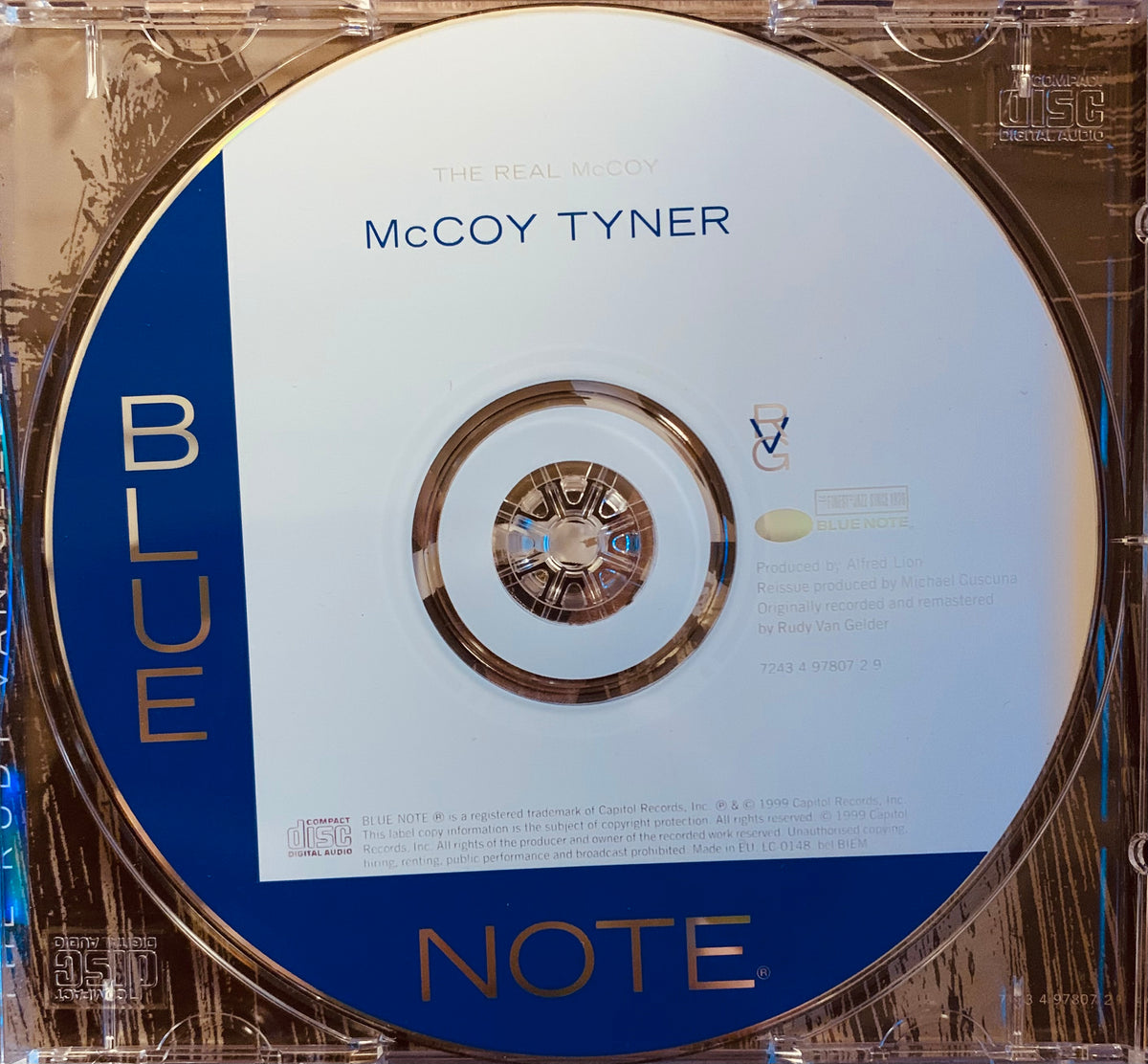 Blue vinyl record cd 001 with gold lettering and metallic hub in original clear plastic case