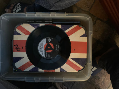 Black vinyl record soul 7 with london american recordings white label on union jack surface inside clear plastic case