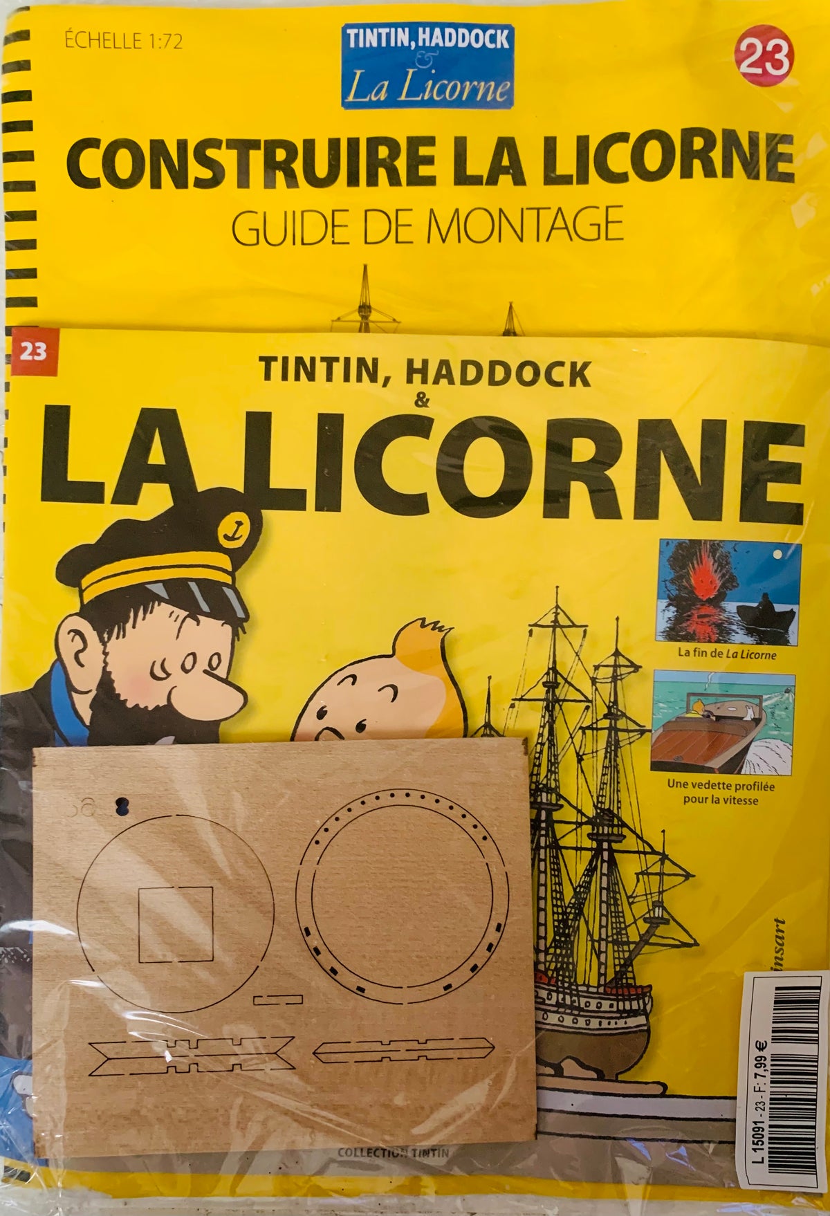 Yellow booklet titled la licorne featuring black text and illustrations of tintin haddock and the ship la licorne
