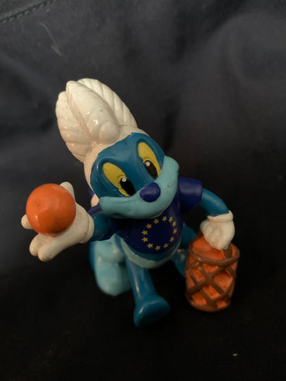Blue and white smurf figurine wearing european union vest holding orange basketball and basket toys 001