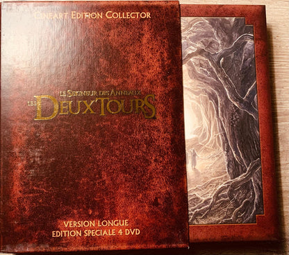 Red textured leather-bound collector’s edition box for the lord of the rings the return of the king featuring gold lettering and forest illustration