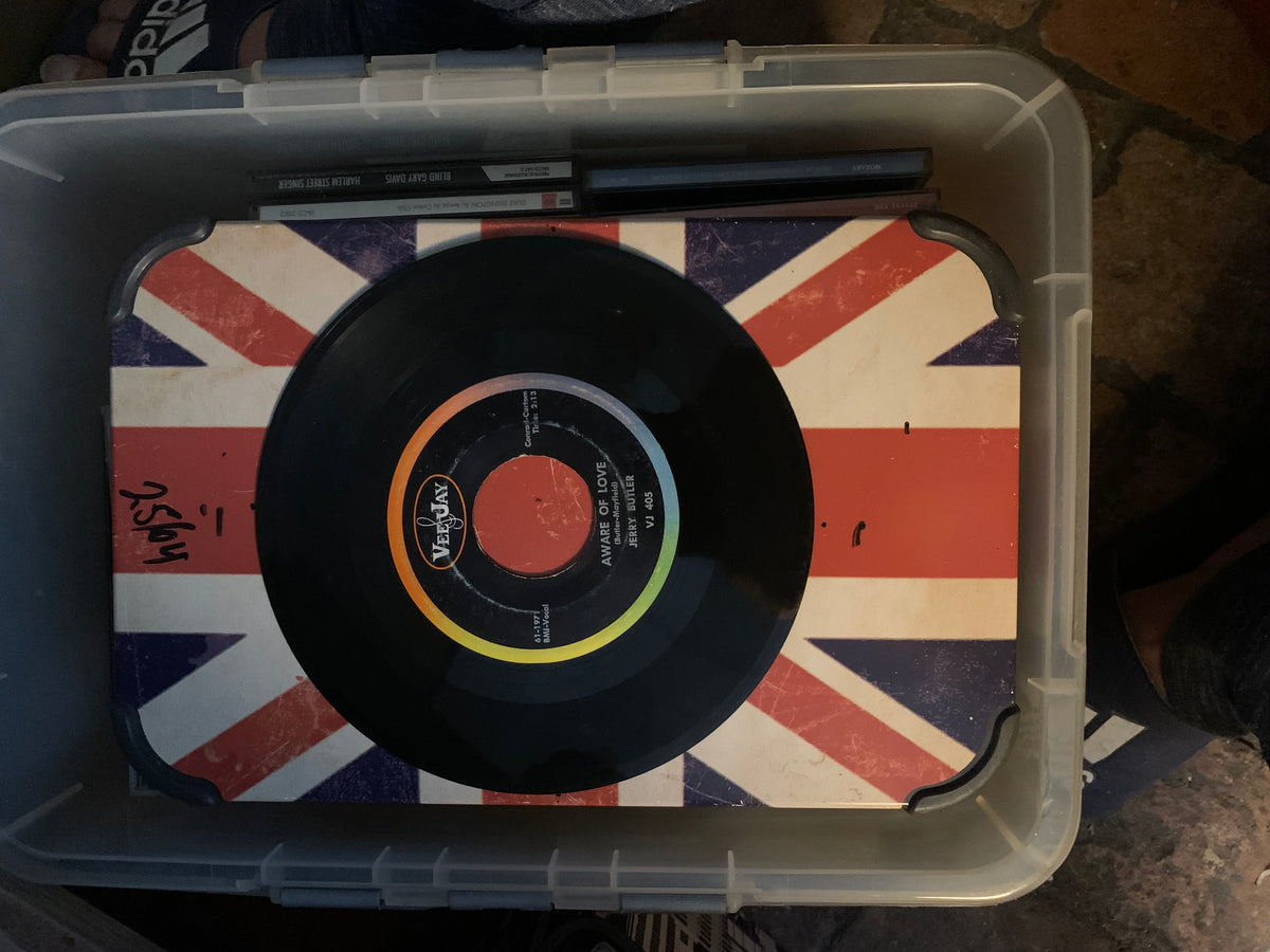 Black vinyl record soul 7 with colorful verjay label resting on union jack themed surface