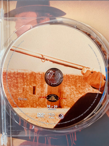 Dvd 3 coffrets featuring a sepia-toned dvd disc with a man in a hat holding a rifle and the mgm logo