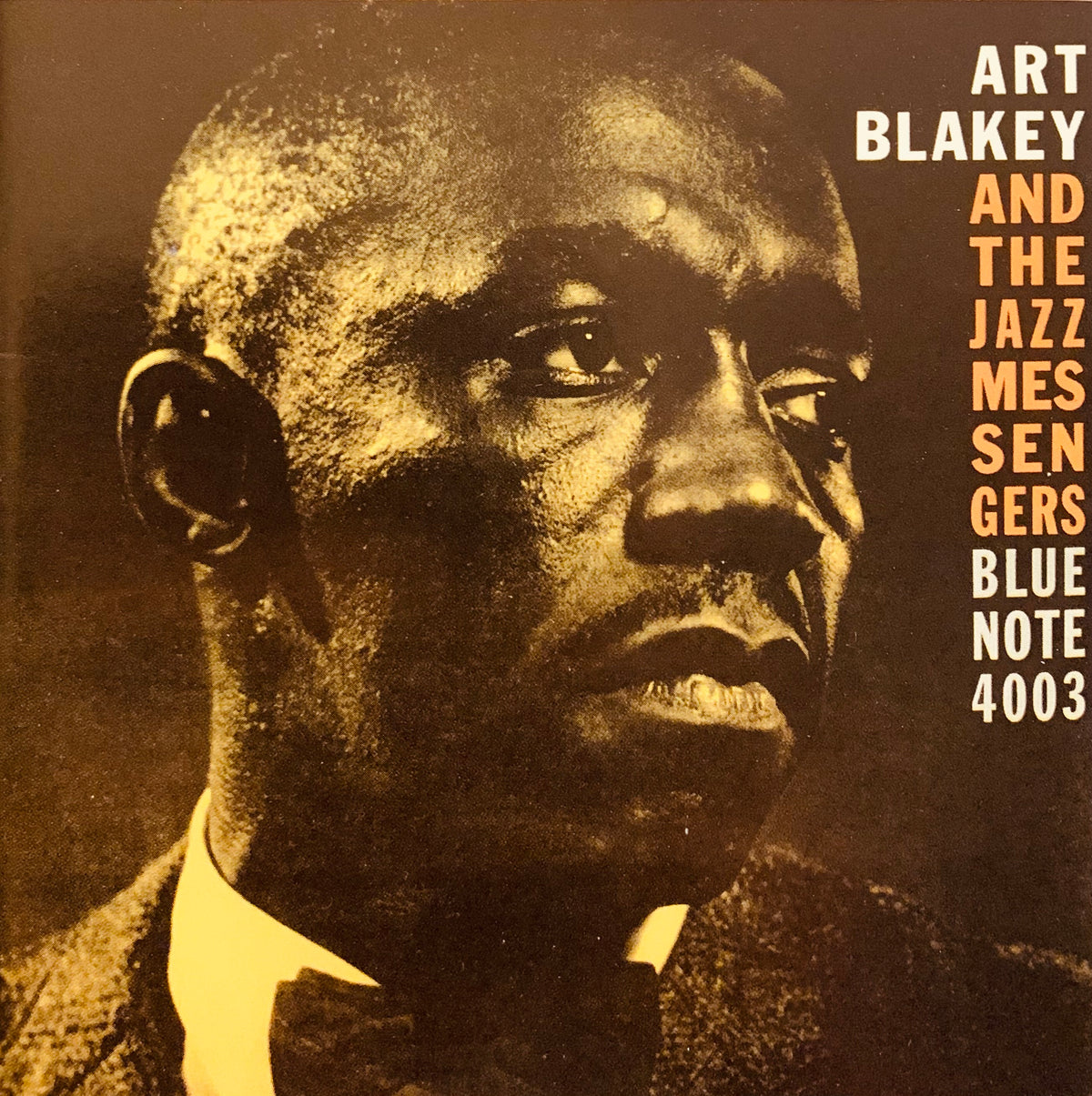 Sepia-toned album cover featuring art blakey in formal attire for CD 001 music collection