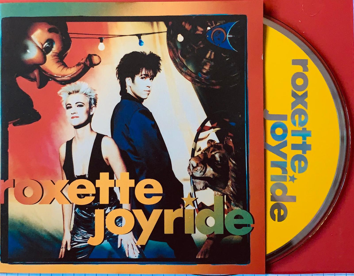 The roxyette joyride album cover features vibrant colorful artwork with band members for the music product joyride