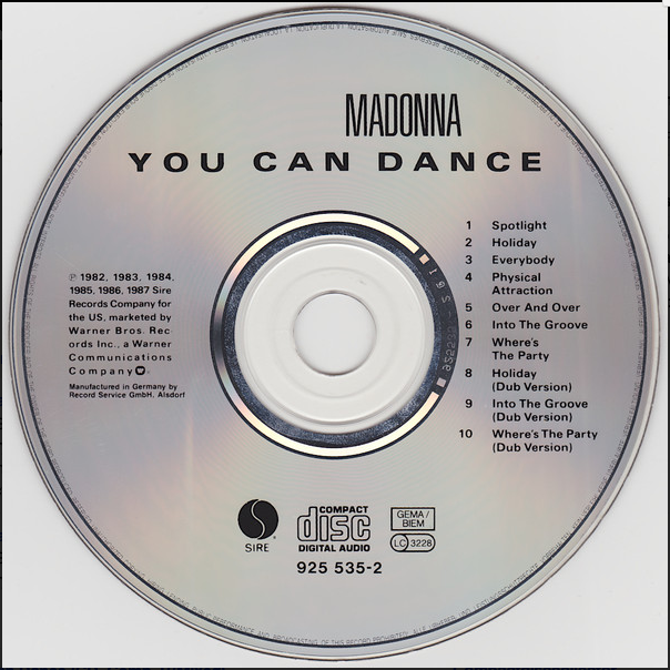 Silver compact disc with black text showing madonna you can dance cd album remixes and dub versions track listing