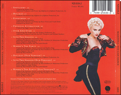 Cd album cover for Madonna you can dance featuring Madonna in a black and red sequined outfit with gold zipper detailing