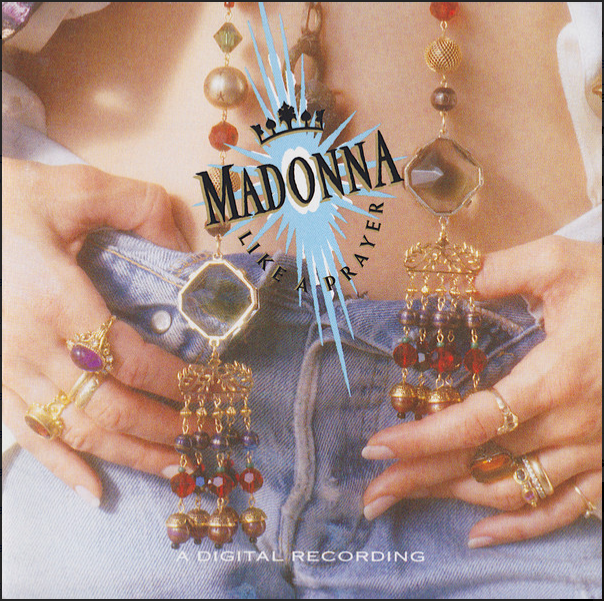 Gold-toned chandelier earrings with dangling red and amber beads and hexagonal crystal accents from madonna like a prayer cd album