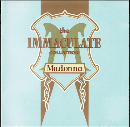 Cd madonna the immaculate collection album cover with shield-shaped gold and brown emblem on light blue background