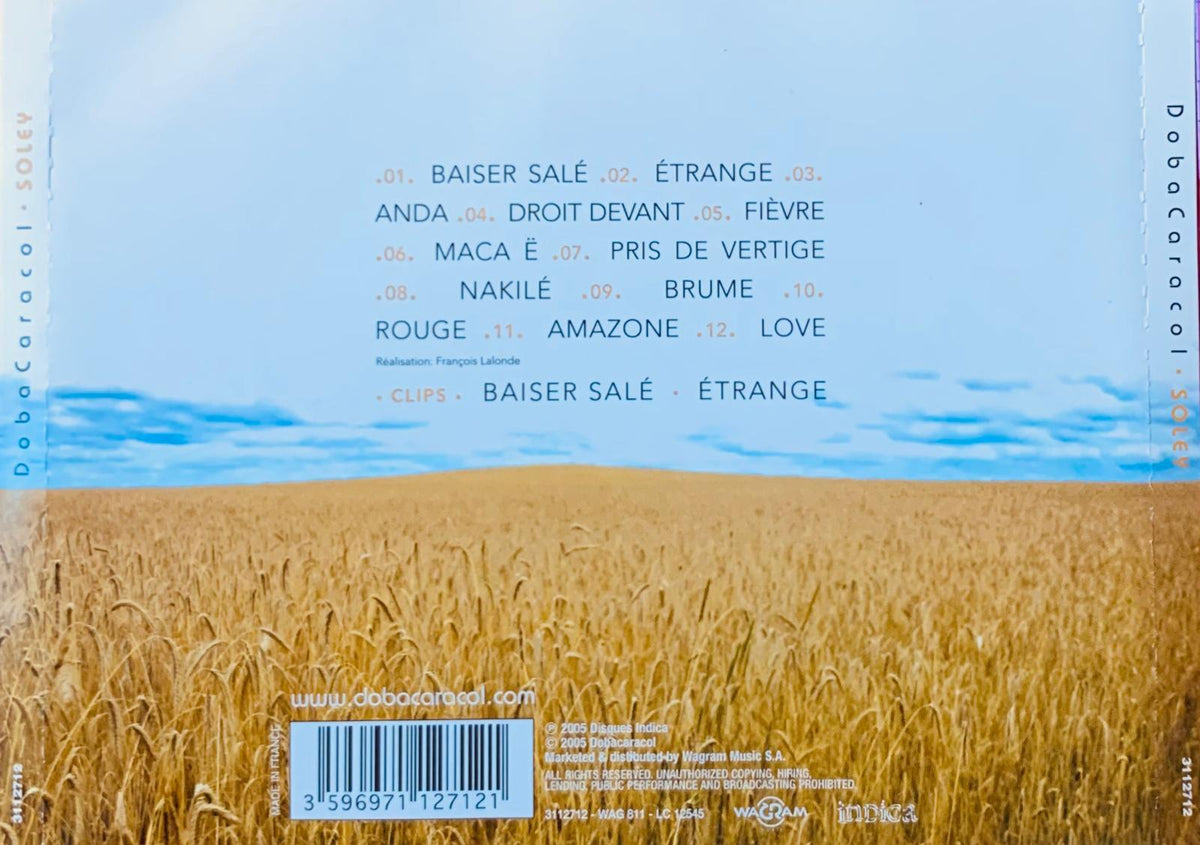 The back cover of the music album soley by doba caracol shows a golden wheat field under a light blue sky with track listings