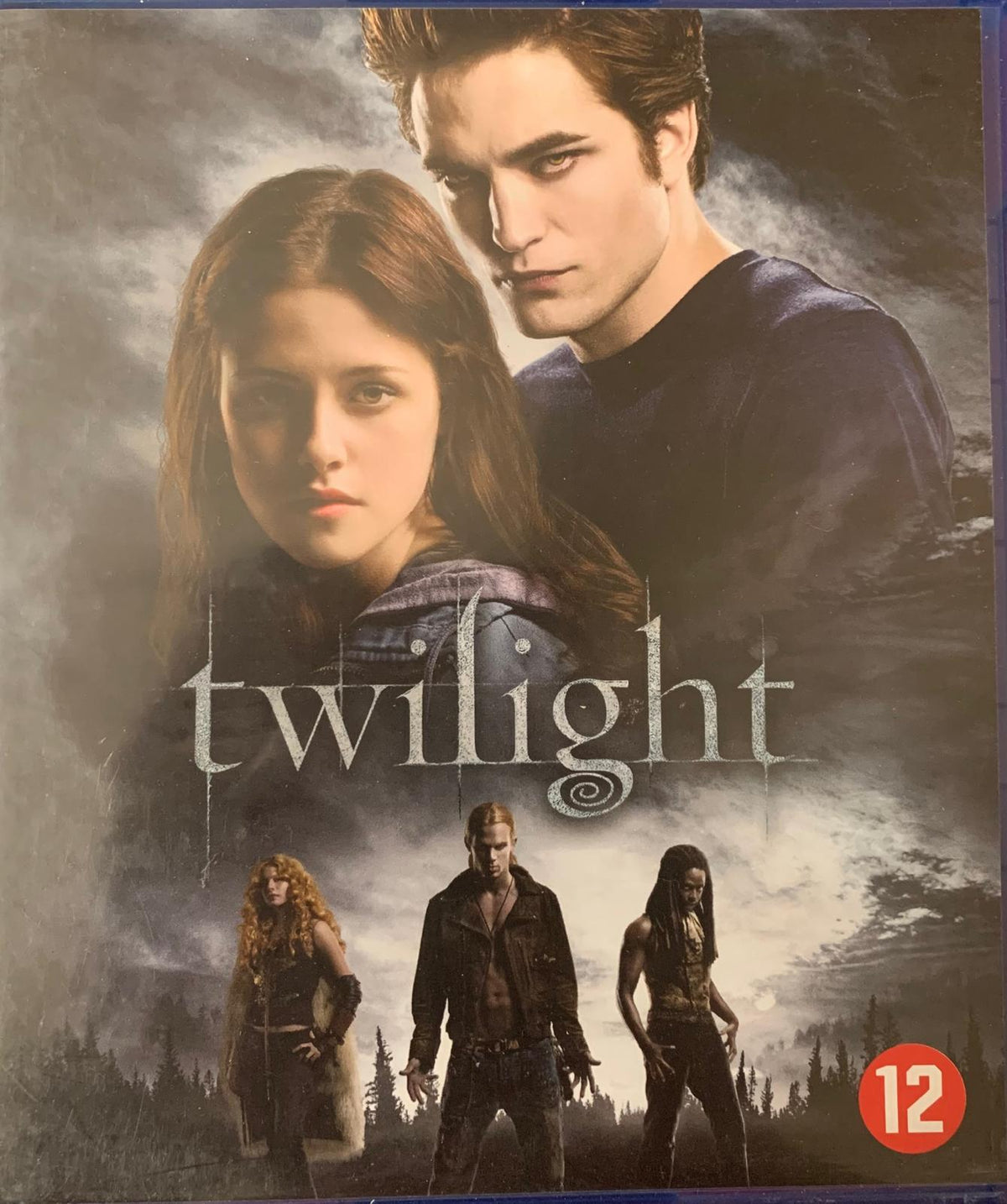 Twilight blu-ray movie cover with a dark moody design and silver title against a stormy sky backdrop