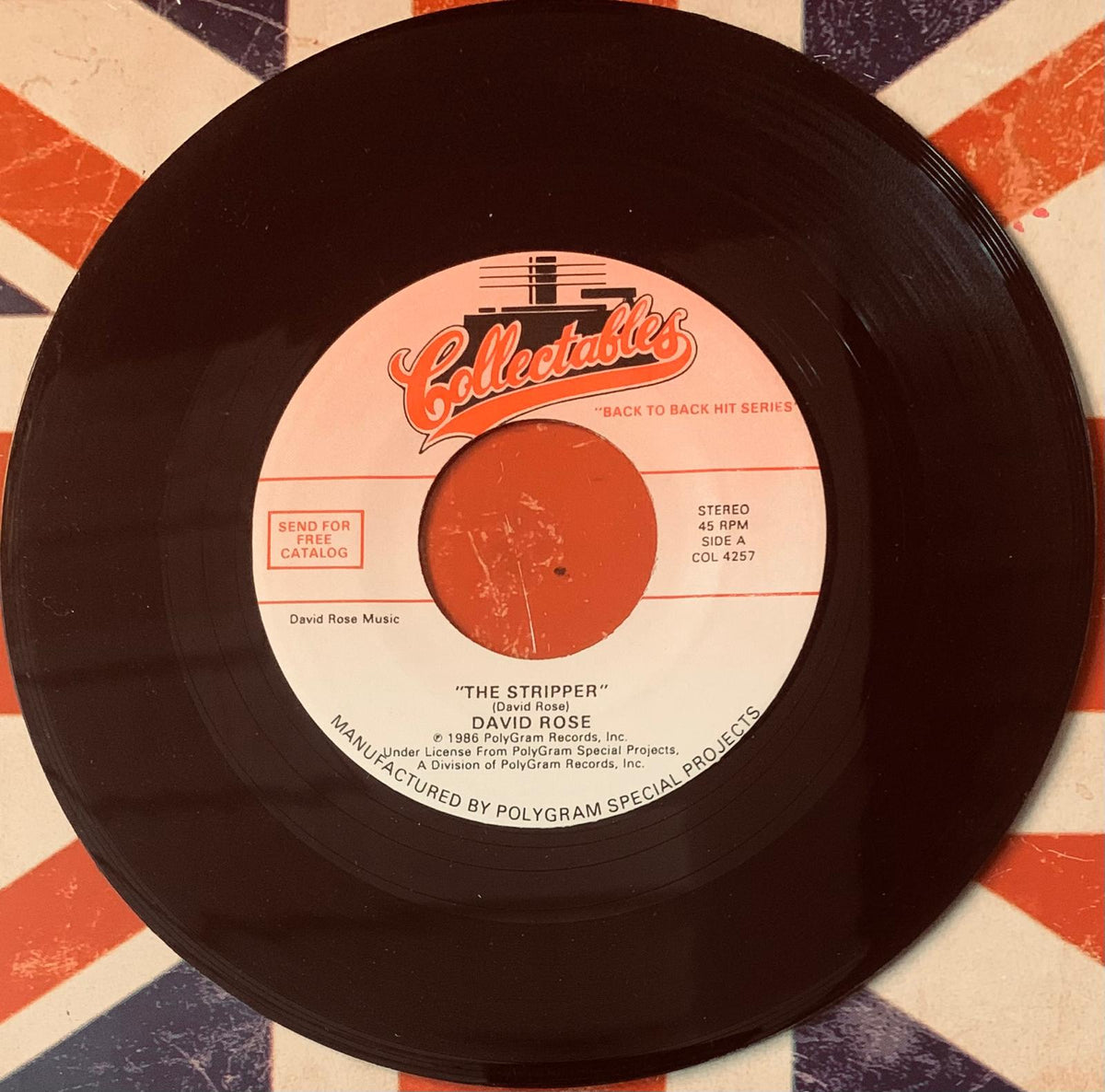 Black vinyl 45 rpm record the stripper by david rose with white and orange collectables label for original 45t vinyl
