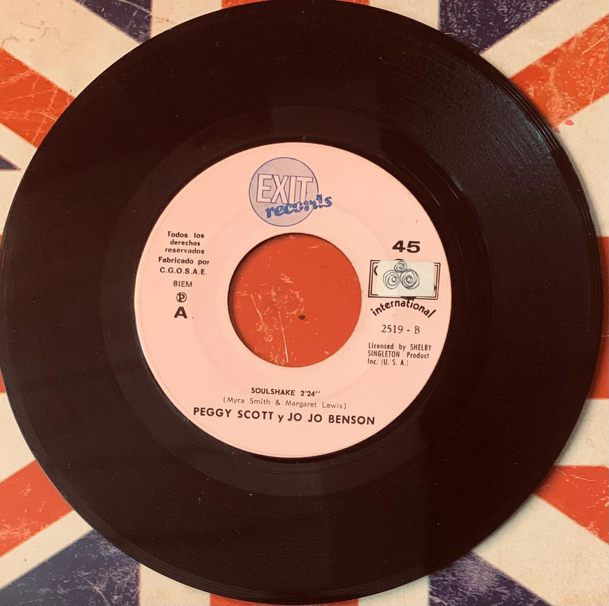 Black vinyl 45 rpm single with white exit records label and orange center by peggy scott and jo jo benson