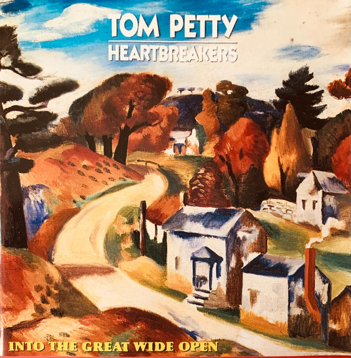 The album cover for tom petty and the heartbreakers into the great wide open shows a painted autumn landscape with houses